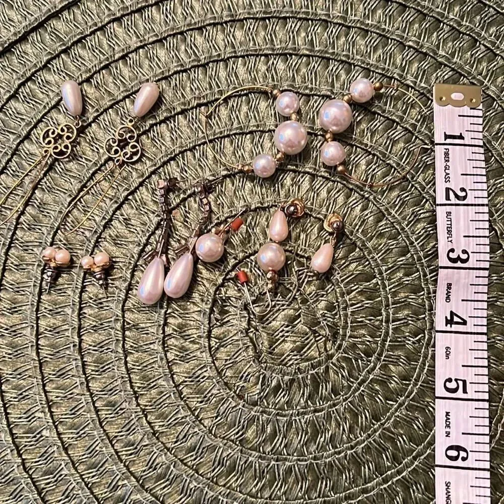 6 pair vintage faux pearl and gold colored earrings EVC